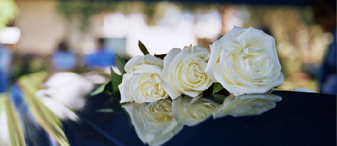 coffin at funeral, wrongful death