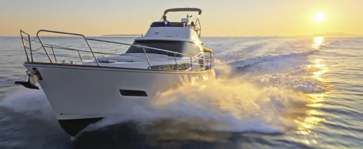 Couple sailing yacht over ocean