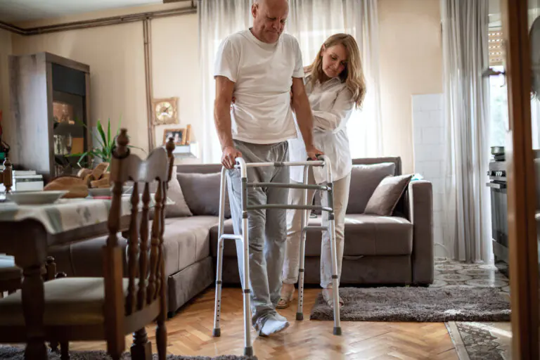 Wife helping her injured husband